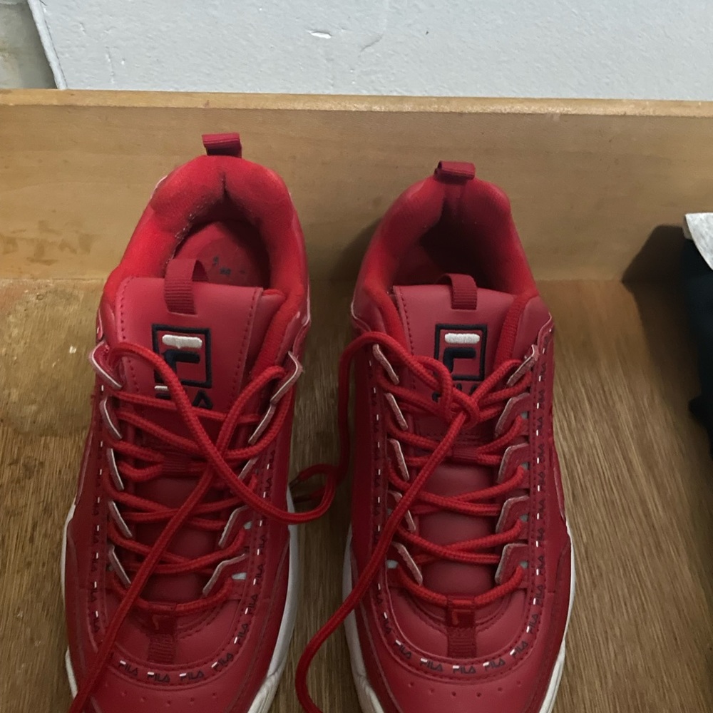 Red filas worn a few time comes with box